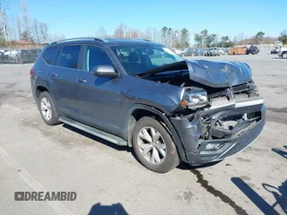 2018 Volkswagen Atlas SE with VIN 1V2CR2CA0JC571988, listed as a IAAI auction lot 41848862 with 96,426 mi miles and . Bid and sale history available at DreamBid. Image 1.