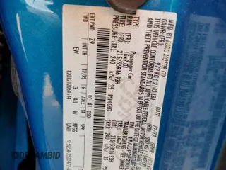 2013 Ford Focus SE with VIN 1FADP3F23DL208259, listed as a Copart auction lot 62009465 with 218,363 mi miles and Salvage title. Bid and sale history available at DreamBid. Image 12.