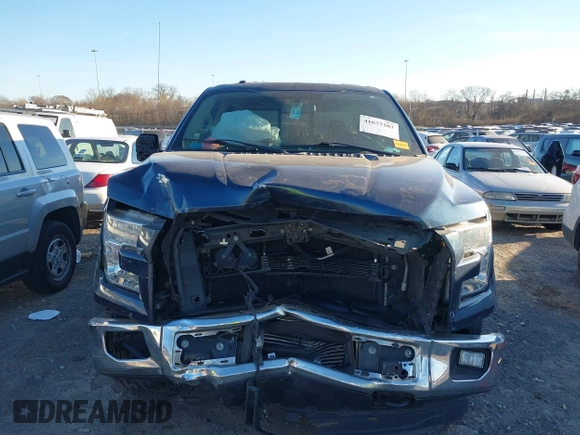 2015 Ford F-150 XLT with VIN 1FTEW1EP7FFD00589, listed as a IAAI auction lot 41677203 with 156,064 mi miles. Bid and sale history available at carsss.com. Image 12.