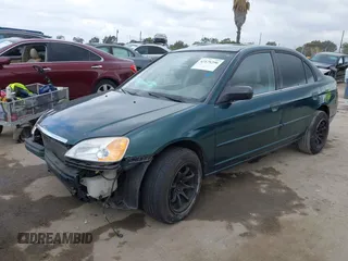 2001 Honda Civic LX with VIN JHMES16571S002955, listed as a IAAI auction lot 42128296 with 223,009 mi miles and . Bid and sale history available at DreamBid. Image 2.