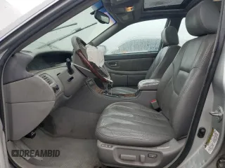 2004 Toyota Avalon XL z VIN 4T1BF28B94U380488, wystawiony jako Copart lot #57809445 z przebiegiem 103 078 mil mil oraz Szkoda całkowita • Salvage title. Historia ofert i sprzedaży dostępna na DreamBid. Obrazek 7.