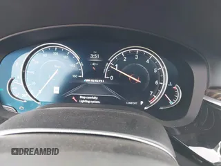 2018 BMW 5 Series M550i xDrive with VIN WBAJB9C55JB035694, listed as a IAAI auction lot 42122730 with 61,561 mi miles and . Bid and sale history available at DreamBid. Image 7.