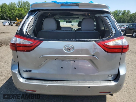 2015 Toyota Sienna Limited with VIN 5TDDK3DC4FS111836, listed as a Copart auction lot 61940595 with 111,579 mi miles and Salvage title. Bid and sale history available at DreamBid. Image 6.