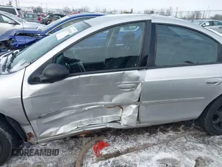 2003 Dodge Neon SXT with VIN 1B3ES56C93D168622, listed as a IAAI auction lot 41583349 with 153,009 mi miles. Bid and sale history available at carsss.com. Image 6.