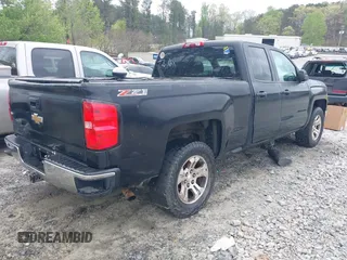 2015 Chevrolet Silverado 1500 LT with VIN 1GCVKREC3FZ170154, listed as a IAAI auction lot 41940479 with 200,965 mi miles. Bid and sale history available at carsss.com. Image 4.