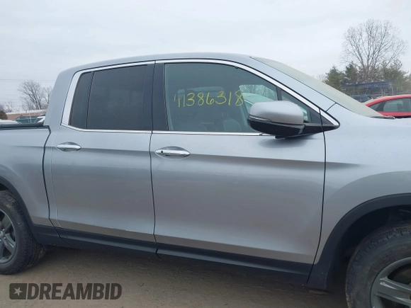 2021 Honda Ridgeline RTL-E with VIN 5FPYK3F79MB010091, listed as a IAAI auction lot 41386318 with 37,996 mi miles and . Bid and sale history available at DreamBid. Image 13.