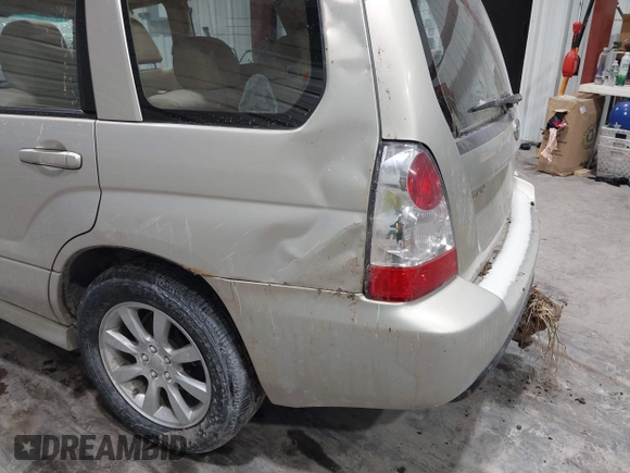 2007 Subaru Forester X w/Premium Pkg with VIN JF1SG65657G703816, listed as a IAAI auction lot 41497811 with 124,286 mi miles. Bid and sale history available at carsss.com. Image 14.