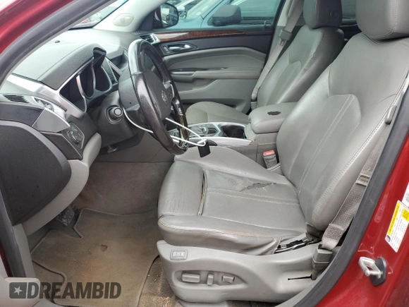 2012 Cadillac SRX Performance Collection with VIN 3GYFNBE39CS655341, listed as a Copart auction lot 62350625 with 156,043 mi miles and Salvage title. Bid and sale history available at DreamBid. Image 7.
