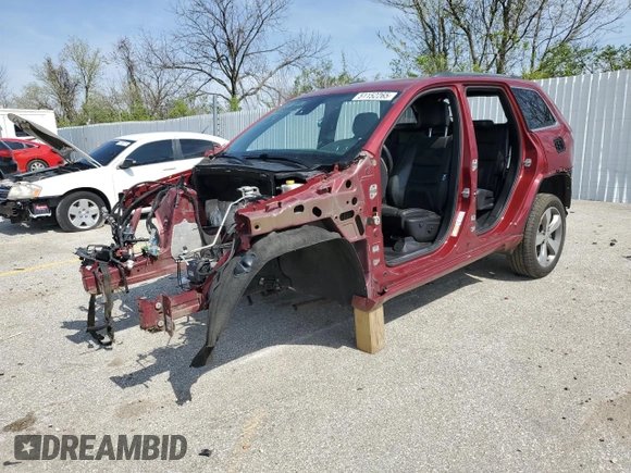 2014 Jeep Grand Cherokee Overland with VIN 1C4RJFCGXEC123682, listed as a Copart auction lot 51152265 with Not Provided miles and Salvage Title. Bid and sale history available at DreamBid. Image 1.