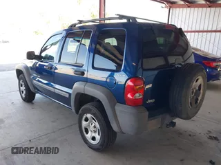 2002 Jeep Liberty Sport with VIN 1J4GL48K32W145174, listed as a IAAI auction lot 42028324 with 291,896 mi miles. Bid and sale history available at carsss.com. Image 3.