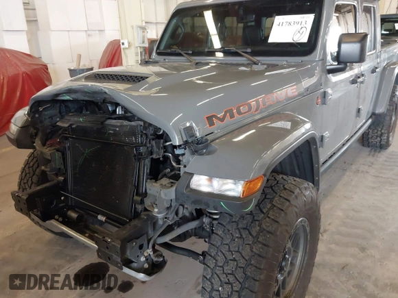 2021 Jeep Gladiator Mojave with VIN 1C6JJTEG1ML596109, listed as a IAAI auction lot 41783913 with 71,112 mi miles and . Bid and sale history available at DreamBid. Image 17.