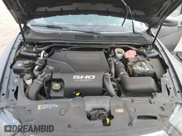 2015 Ford Taurus SHO with VIN 1FAHP2KT8FG158965, listed as a Copart auction lot 89404715 with 122,032 mi miles and Salvage Title. Bid and sale history available at DreamBid. Image 12.