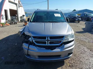 2019 Dodge Journey SE Value with VIN 3C4PDCAB3KT746548, listed as a IAAI auction lot 40202083 with 150,699 mi miles and . Bid and sale history available at DreamBid. Image 12.