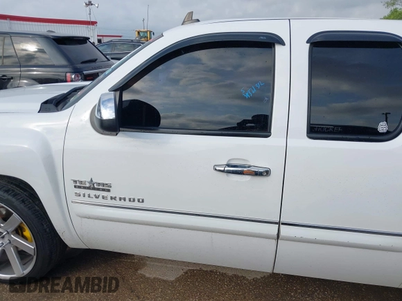2013 Chevrolet Silverado 1500 LT with VIN 1GCRCSE05DZ366248, listed as a IAAI auction lot 42122068 with 233,316 mi miles and . Bid and sale history available at DreamBid. Image 14.