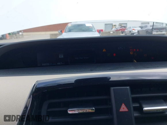 2022 Toyota Prius L Eco with VIN JTDKAMFUXN3157225, listed as a IAAI auction lot 39292379 with 59,333 mi miles and . Bid and sale history available at DreamBid. Image 7.