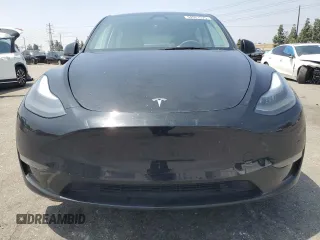 2024 Tesla Model Y Long Range with VIN 7SAYGDEE4RA228916, listed as a Copart auction lot 54921575 with 13,607 mi miles and Salvage title. Bid and sale history available at DreamBid. Image 5.