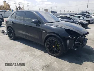2017 Porsche Cayenne S E-Hybrid with VIN WP1AE2A23HLA71302, listed as a Copart auction lot 54586635 with 102,228 mi miles and Salvage title. Bid and sale history available at DreamBid. Image 4.