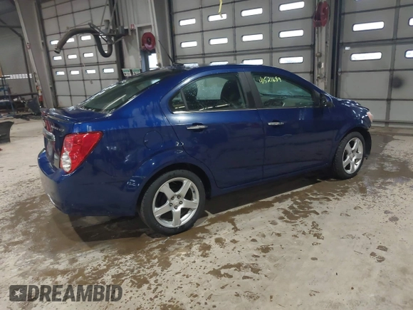2014 Chevrolet Sonic LTZ with VIN 1G1JE5SB5E4226187, listed as a IAAI auction lot 41521689 with 73,325 mi miles. Bid and sale history available at carsss.com. Image 4.