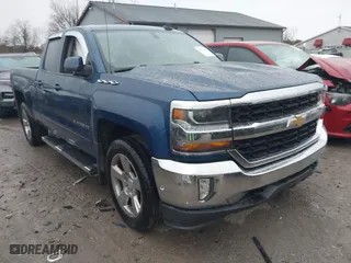 2018 Chevrolet Silverado 1500 LT with VIN 1GCVKREC4JZ215630, listed as a IAAI auction lot 40794226 with 165,323 mi miles. Bid and sale history available at carsss.com. Image 1.