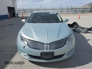 2014 Lincoln MKZ Hybrid with VIN 3LN6L2LU9ER808684, listed as a Copart auction lot 52974105 with 123,486 mi miles and Salvage Title. Bid and sale history available at DreamBid. Image 5.