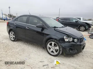 2012 Chevrolet Sonic LTZ z VIN 1G1JE5SB2C4173638, wystawiony jako Copart lot #84634474 z przebiegiem 148 247 mil mil oraz Szkoda całkowita • Salvage title. Historia ofert i sprzedaży dostępna na DreamBid. Obrazek 4.