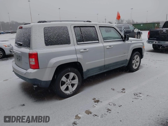 2011 Jeep Patriot Latitude X with VIN 1J4NF4GB4BD165266, listed as a IAAI auction lot 41267575 with 96,402 mi miles and . Bid and sale history available at DreamBid. Image 4.