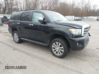 2016 Toyota Sequoia Limited with VIN 5TDJY5G14GS143565, listed as a IAAI auction lot 41823068 with 144,566 mi miles. Bid and sale history available at carsss.com. Image 1.