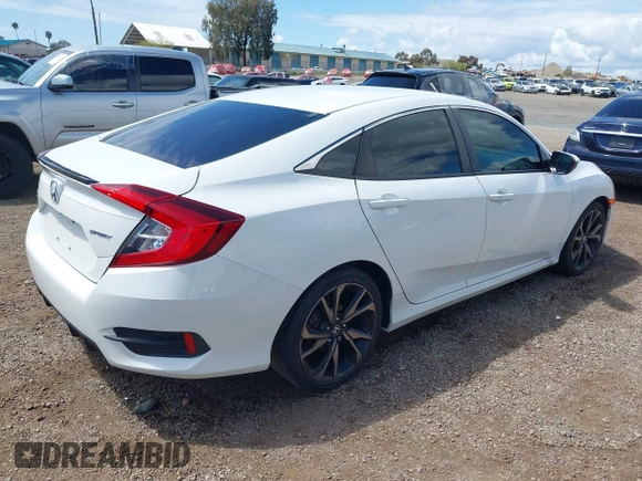 2019 Honda Civic Sport with VIN 2HGFC2F85KH600037, listed as a IAAI auction lot 42030526 with 82,821 mi miles and . Bid and sale history available at DreamBid. Image 4.