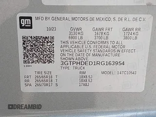 2024 GMC Sierra 1500 SLT with VIN 3GTPHDED1RG163954, listed as a IAAI auction lot 41548691 with 52,065 mi miles and . Bid and sale history available at DreamBid. Image 9.