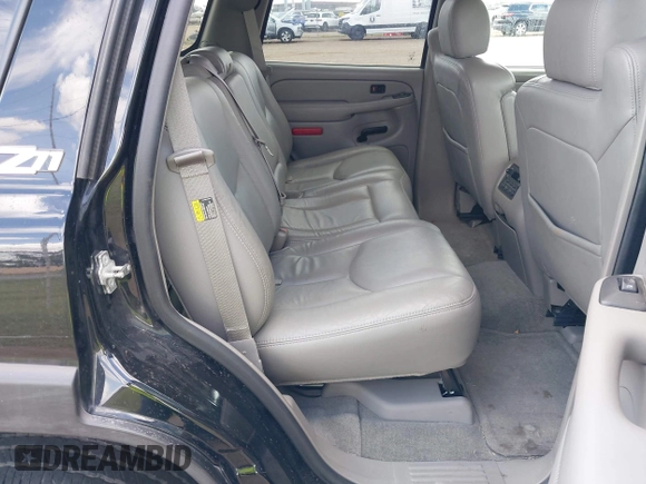 2004 Chevrolet Tahoe Z71 with VIN 1GNEK13ZX4R184775, listed as a IAAI auction lot 42433671 with 77,019 mi miles and . Bid and sale history available at DreamBid. Image 8.