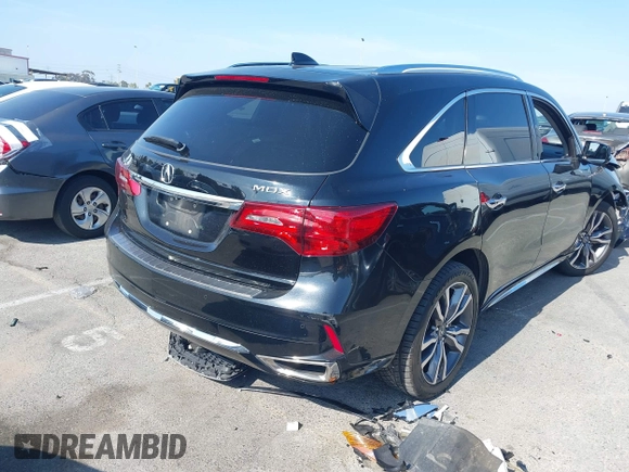2019 Acura MDX Advance with VIN 5J8YD3H89KL001475, listed as a IAAI auction lot 42489400 with 100,281 mi miles and . Bid and sale history available at DreamBid. Image 4.