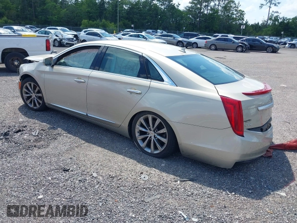 2014 Cadillac XTS z VIN 2G61L5S39E9159583, wystawiony jako IAAI lot #36024597 z przebiegiem 118 461 mil mil oraz . Historia ofert i sprzedaży dostępna na DreamBid. Obrazek 3.