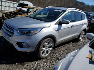 2019 Ford Escape Titanium with VIN 1FMCU9J98KUB53669, listed as a Copart auction lot 47344715 with 84,051 mi miles and Salvage title. Bid and sale history available at DreamBid. Image 1.