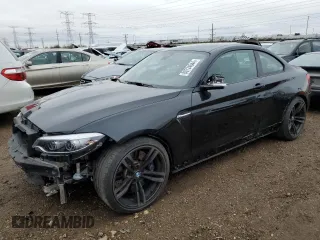 2018 BMW M2 with VIN WBS1J5C51JVD37394, listed as a Copart auction lot 80724644 with 22,827 mi miles and Salvage Title. Bid and sale history available at carsss.com. Image 1.