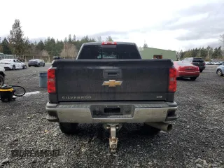 2015 Chevrolet Silverado 3500HD LTZ with VIN 1GC4K0E80FF509652, listed as a Copart auction lot 45758655 with 58,456 mi miles and Salvage Title. Bid and sale history available at DreamBid. Image 6.