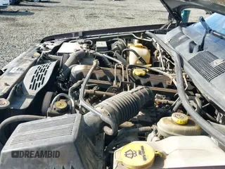 1996 Jeep Grand Cherokee Laredo z VIN 1J4GZ58S2TC262980, wystawiony jako IAAI lot #41949514 z przebiegiem 269 674 mil mil oraz . Historia ofert i sprzedaży dostępna na DreamBid. Obrazek 15.