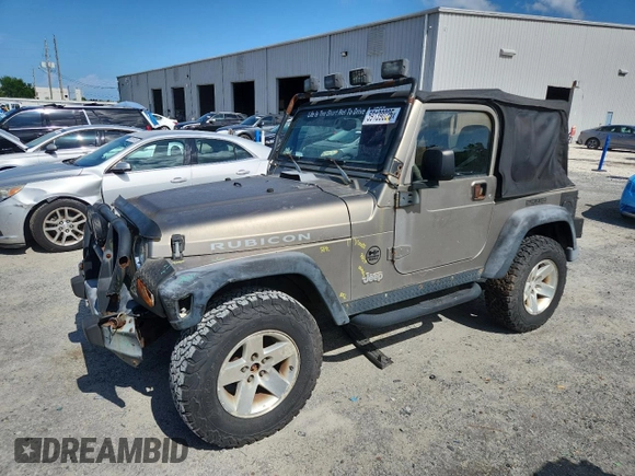 2003 Jeep Wrangler Rubicon with VIN 1J4FA69S13P310131, listed as a Copart auction lot 59139025 with 260,349 mi miles and Salvage title. Bid and sale history available at DreamBid. Image 1.