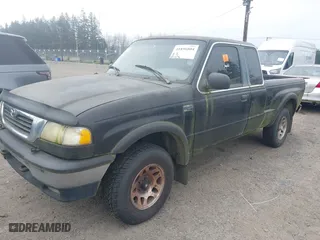 1999 Mazda B-Series 4WD Truck SE with VIN 4F4ZR17X5XTM17667, listed as a IAAI auction lot 41896804 with 101,596 mi miles. Bid and sale history available at carsss.com. Image 2.