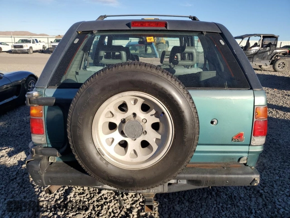 1994 Isuzu Rodeo LS with VIN 4S2CY58V7R4327413, listed as a Copart auction lot 79347724 with 175,944 mi miles and Salvage Title. Bid and sale history available at DreamBid. Image 6.