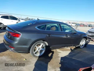 2018 Audi A5 Sportback Premium z VIN WAUDNCF52JA044291, wystawiony jako IAAI lot #41219360 z przebiegiem 86 273 mil mil oraz . Historia ofert i sprzedaży dostępna na DreamBid. Obrazek 13.