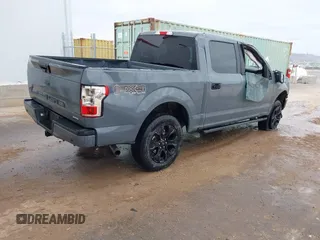 2019 Ford F-150 XL with VIN 1FTEW1EPXKKD78298, listed as a IAAI auction lot 41158508 with 76,676 mi miles and . Bid and sale history available at DreamBid. Image 4.