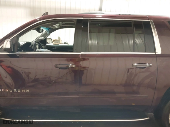2017 Chevrolet Suburban Premier with VIN 1GNSKJKC4HR302244, listed as a IAAI auction lot 40850765 with 180,694 mi miles. Bid and sale history available at carsss.com. Image 14.