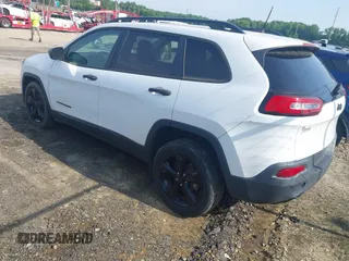 2016 Jeep Cherokee Altitude with VIN 1C4PJLABXGW323881, listed as a IAAI auction lot 42289189 with 147,631 mi miles and . Bid and sale history available at DreamBid. Image 3.