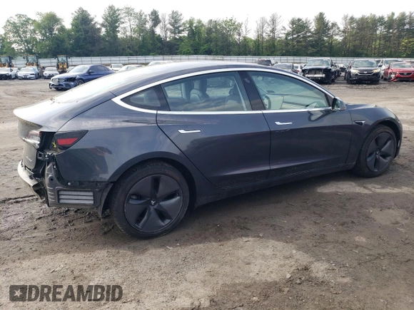 2018 Tesla Model 3 Long Range Battery z VIN 5YJ3E1EB3JF086972, wystawiony jako Copart lot #56290245 z przebiegiem 69 766 mil mil oraz Szkody całkowita. Historia ofert i sprzedaży dostępna na DreamBid. Obrazek 3.