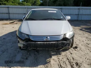 2010 Honda Insight EX z VIN JHMZE2H77AS035113, wystawiony jako Copart lot #54179005 z przebiegiem 165 083 mil mil oraz Szkoda całkowita • Salvage title. Historia ofert i sprzedaży dostępna na DreamBid. Obrazek 5.