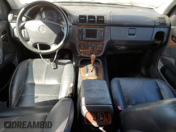 2000 Mercedes-Benz M 320/430/500 with VIN 4JGAB72E5YA173269, listed as a Copart auction lot 71520714 with 239,248 mi miles and Clean title. Bid and sale history available at DreamBid. Image 8.
