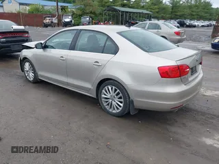 2014 Volkswagen Jetta TDI w/Premium/Nav with VIN 3VWLL7AJ9EM226026, listed as a IAAI auction lot 42219871 with 100,386 mi miles and . Bid and sale history available at DreamBid. Image 3.