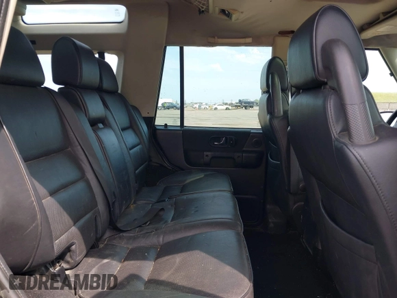 2004 Land Rover Discovery SE with VIN SALTW19464A860565, listed as a IAAI auction lot 42019860 with 153,274 mi miles. Bid and sale history available at carsss.com. Image 8.