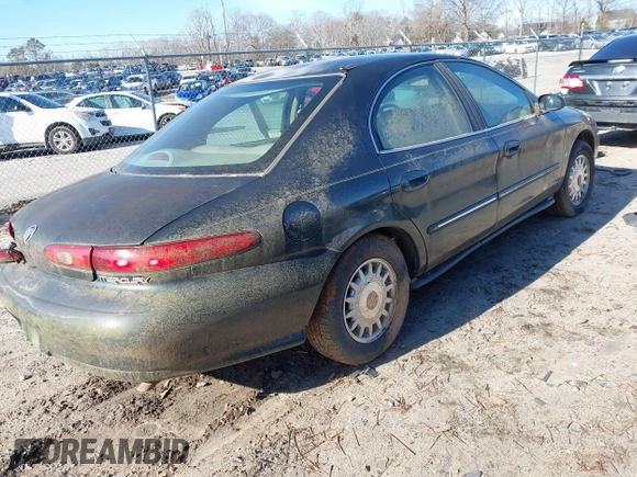 1998 Mercury Sable LS Premium Group with VIN 1MEFM53S0WA638842, listed as a IAAI auction lot 41557457 with 153,443 mi miles and . Bid and sale history available at DreamBid. Image 4.