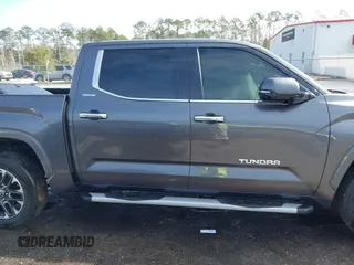 2022 Toyota Tundra Limited with VIN 5TFJA5AB7NX011302, listed as a IAAI auction lot 41400983 with 93,747 mi miles and . Bid and sale history available at DreamBid. Image 13.